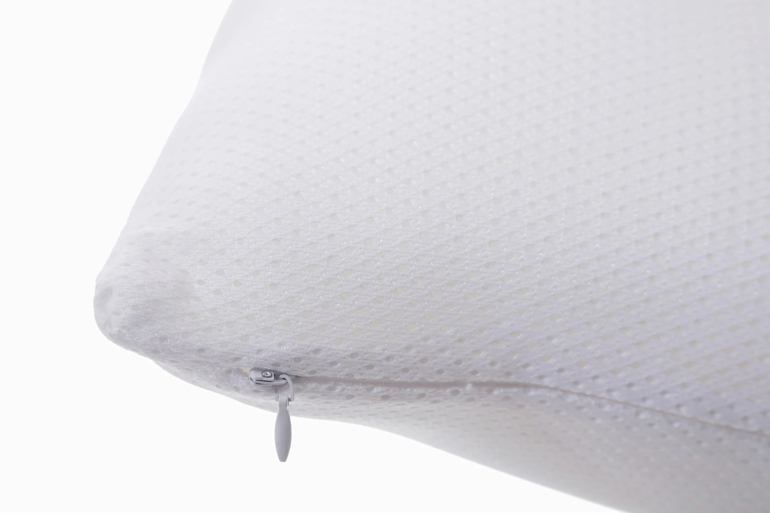 Close up of the materials used in the SleepSure™ Anti-Suffocation pillow.