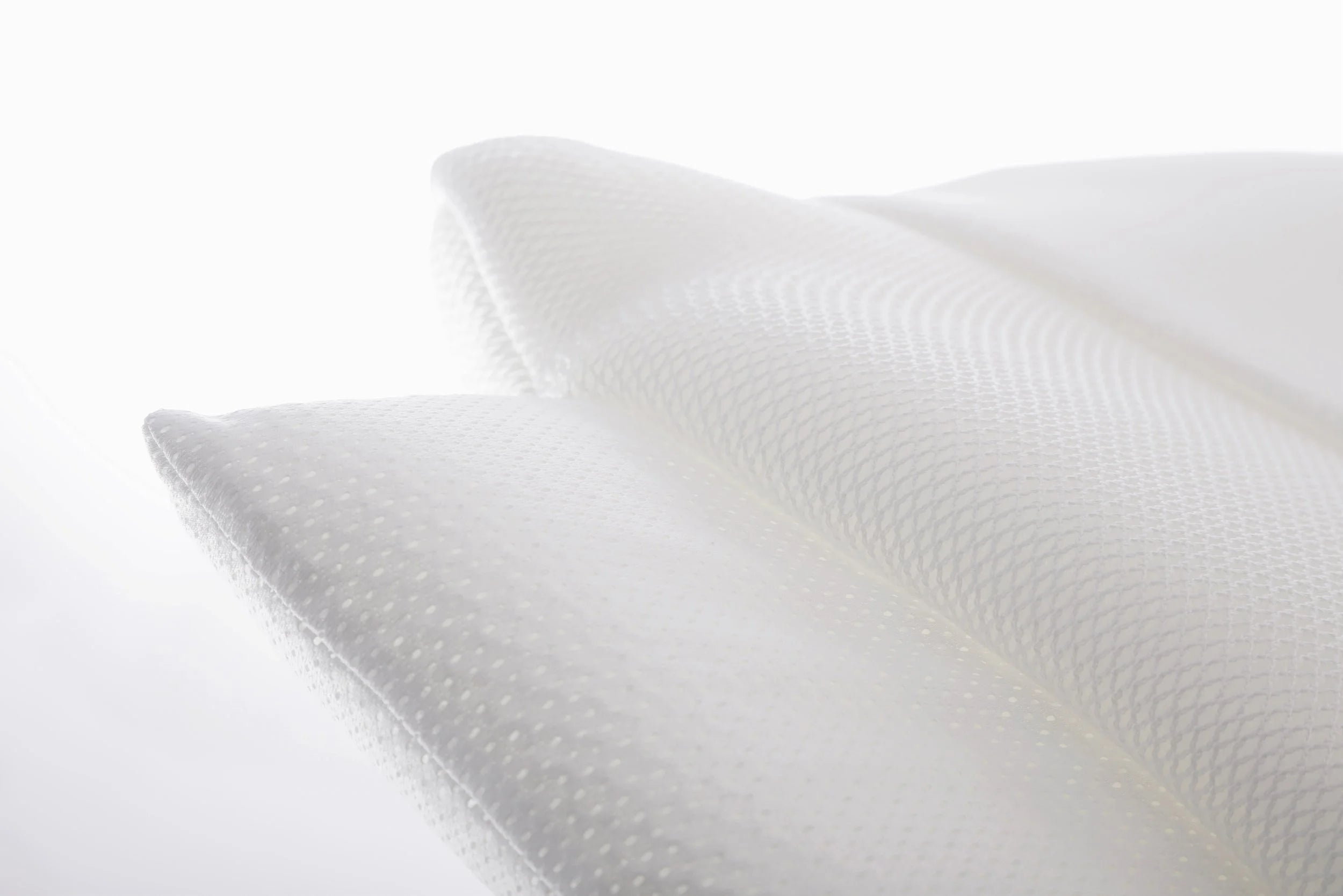 Close up of the materials used in the SleepSure™ Anti-Suffocation pillow.