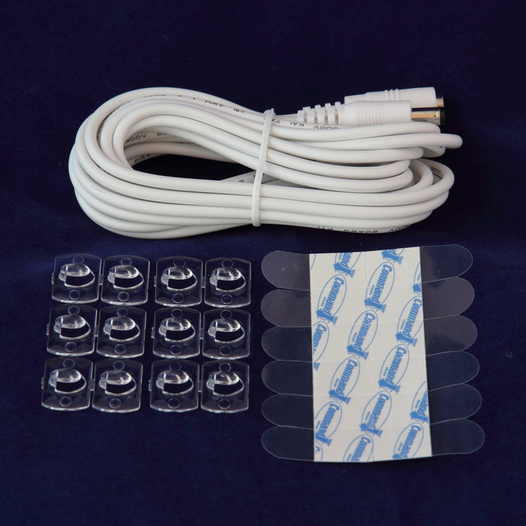 This extension cord adds 12 feet to the standard 9-foot SAMi Camera power cord - resulting in a 21-foot long cord. Use this cord if you need additional length to reach the AC mains outlet. This order also includes twelve Command Strip, damage-free wire clips for safe routing of the cord.